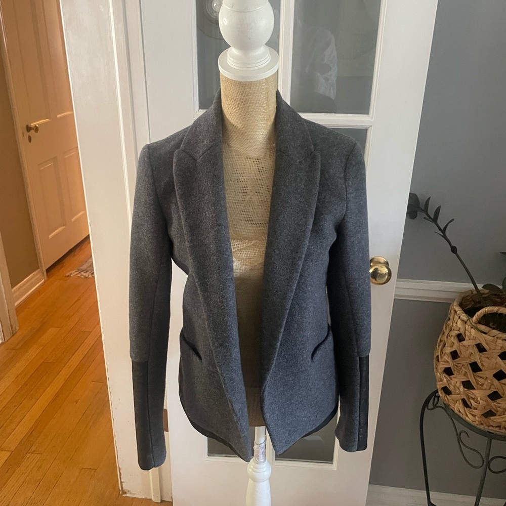 Theory wool blazer with leather trim and zippered sleeves